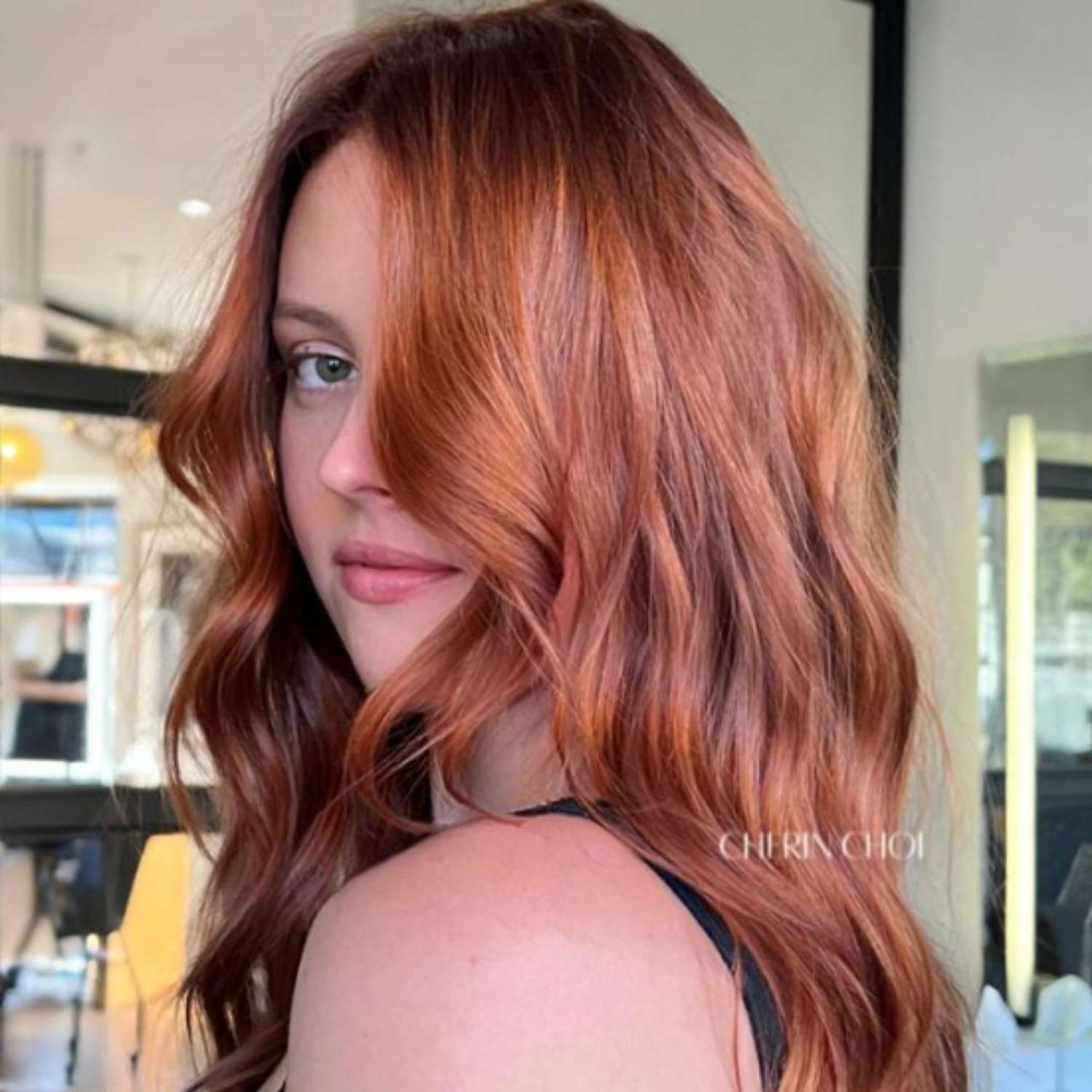 Copper auburn balayaged hair.